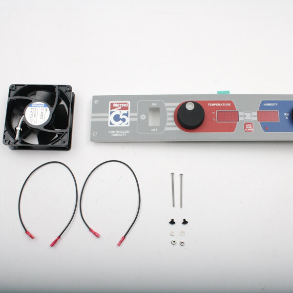 A Metro Retrofit Kit with a fan and wires on a white surface.