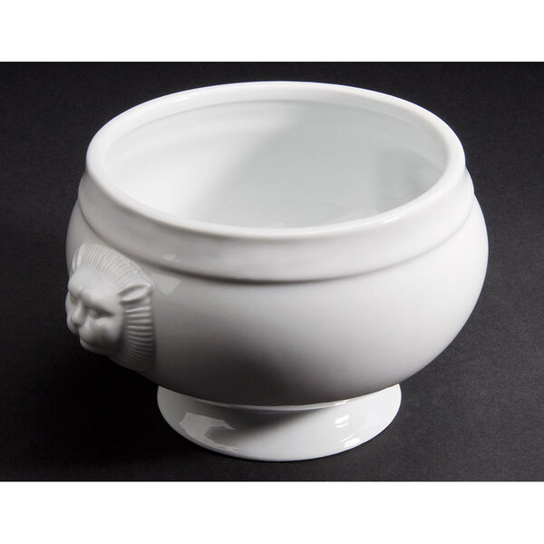 A CAC bright white porcelain lion head bouillon bowl.