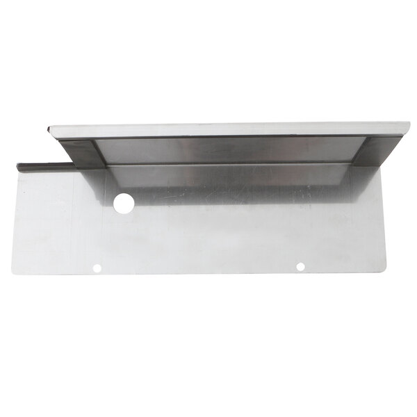 A metal Cleveland cover compartment shelf with holes in it.