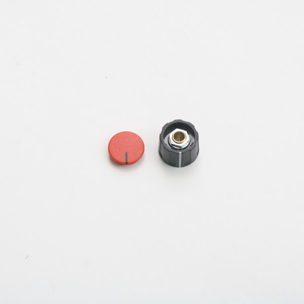 A black and red Alto-Shaam humidity knob.