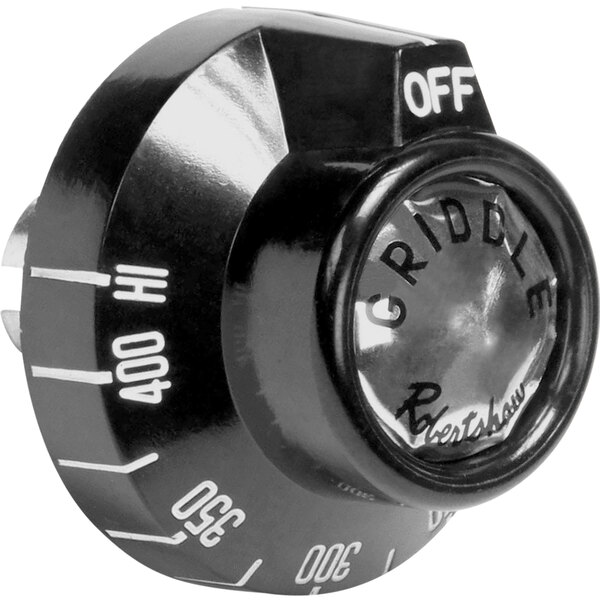 A black dial knob for a Vulcan range with white text.