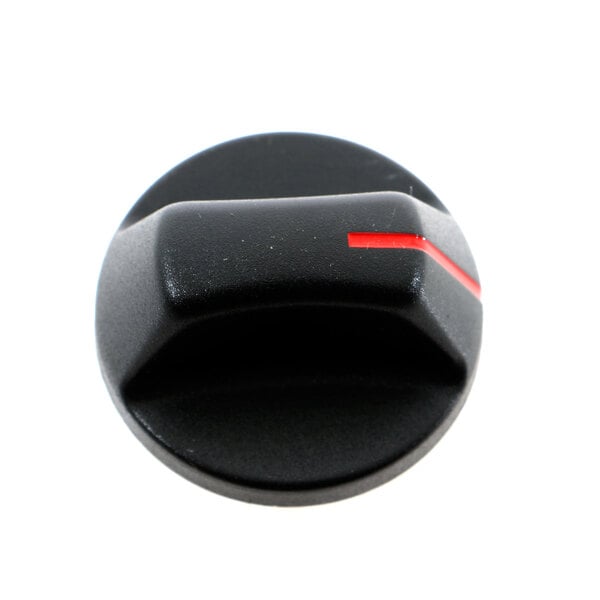A close up of a black knob with a red stripe.