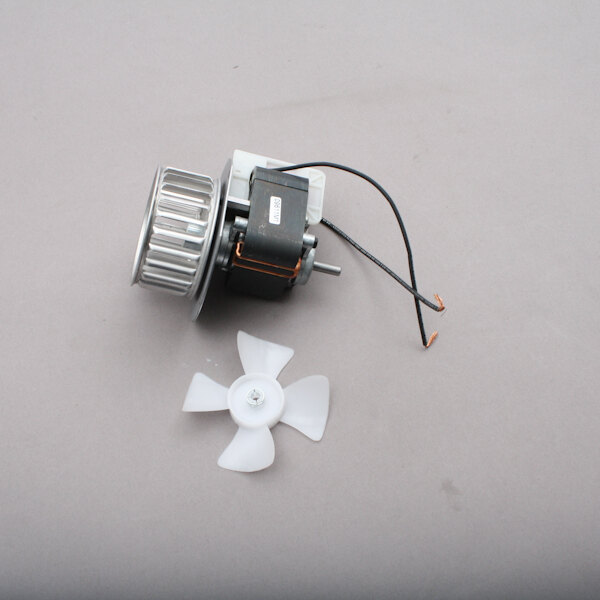 A Henny Penny 120v motor with a white plastic fan blade.