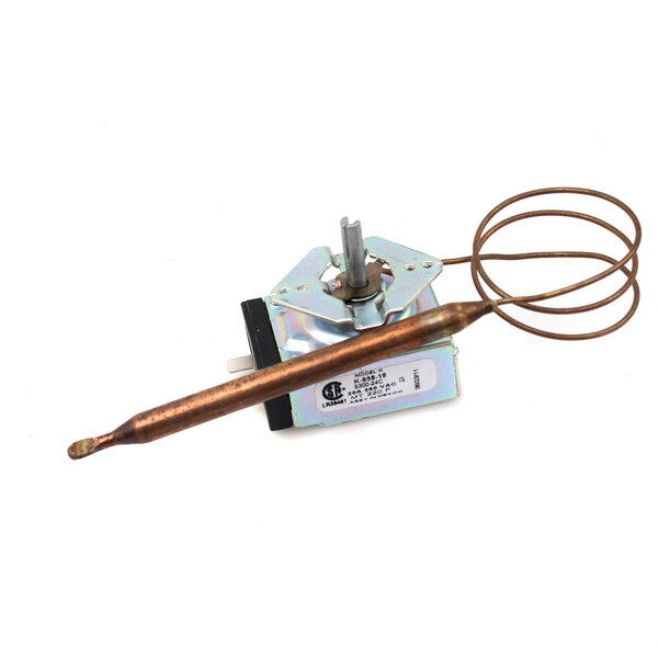 A copper wire and metal device on a white background.