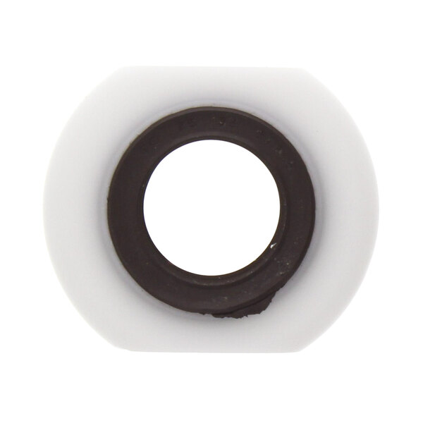 A close-up of a round black rubber seal.
