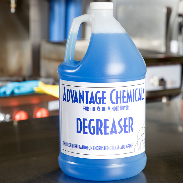 A blue gallon of Advantage Chemicals Concentrated Degreaser on a counter.