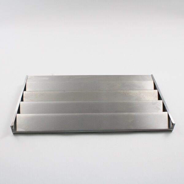 A Traulsen metal louver assembly with four different sized slots.