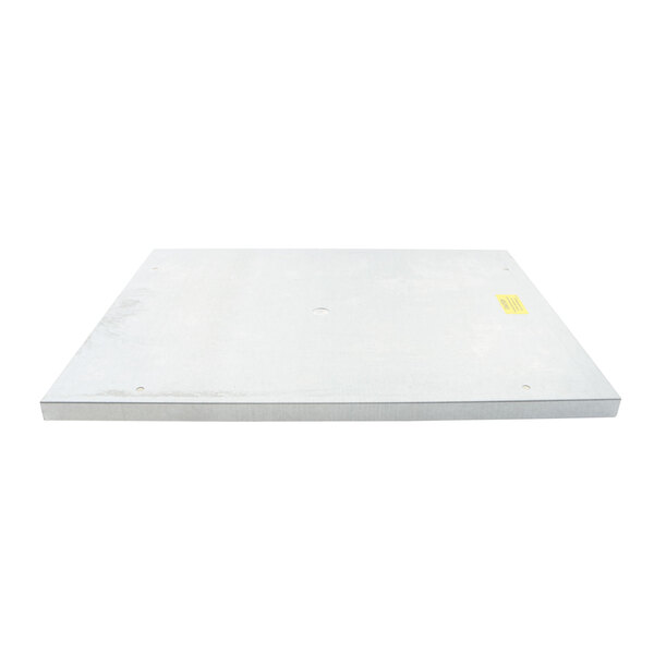 A white rectangular Traulsen evaporator cover with a yellow label.