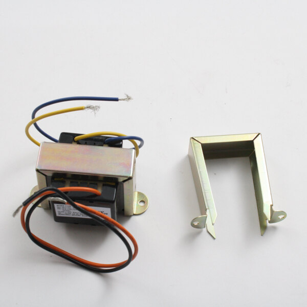 A small metal BKI lighting transformer with wires and two holes.