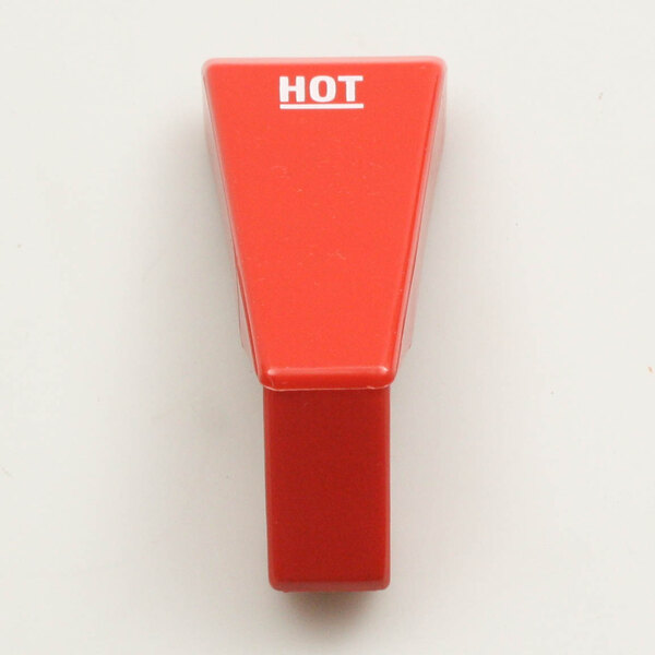 A red rectangular plastic knob with white text that says "hot"