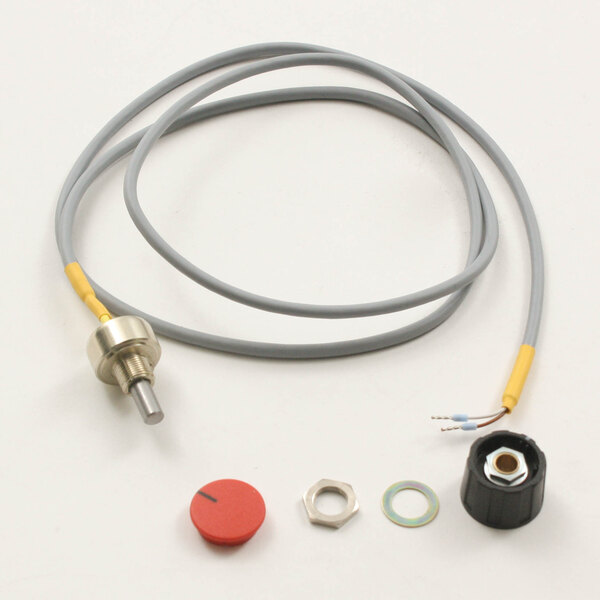 A grey cable with a metal end, a red and black nut, and a red button.