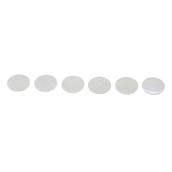 A pack of six white round plastic discs with a white circle on a white background.
