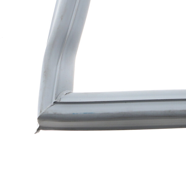 A close-up of a corner of a metal frame with a white background.