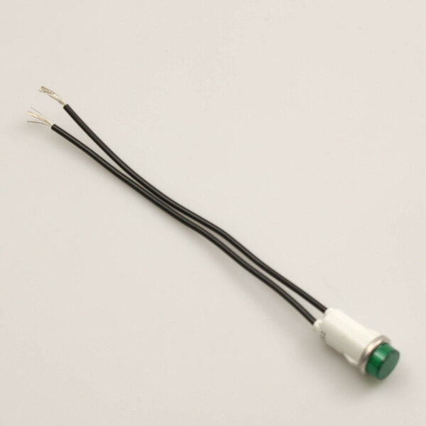 A green Lang indicator light with black wires.