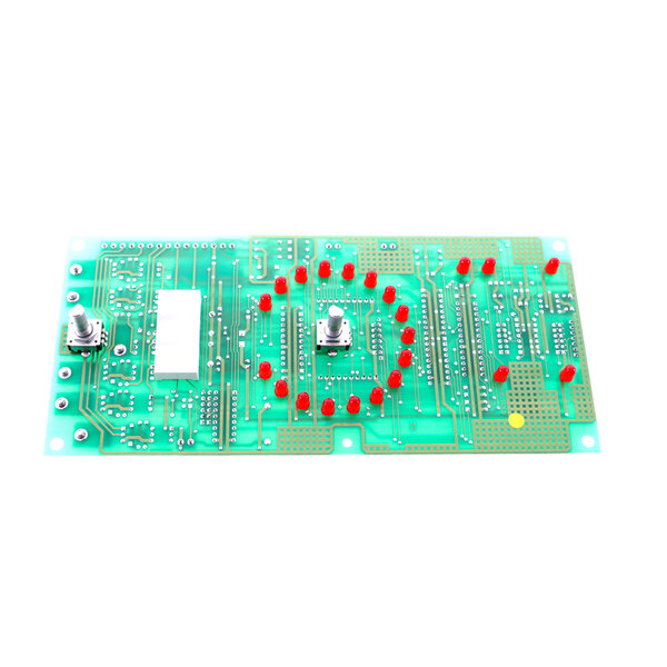 A Lang green circuit board with red dots and screws.