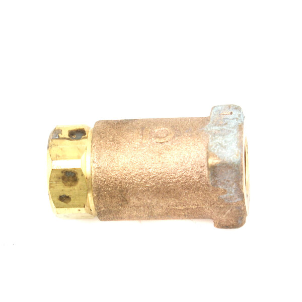 A Wells brass threaded pipe fitting with a brass nut.