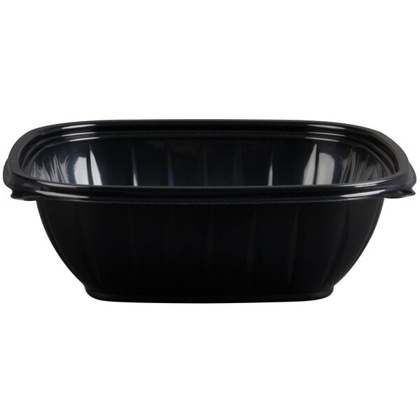 A black Dart square plastic bowl with a black lid.