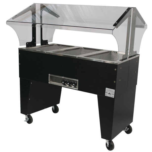 An Advance Tabco stainless steel electric hot food table with an open well on wheels.