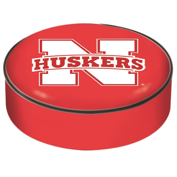 A red round bar stool seat cover with a white "N" and "Nebraska" in red.