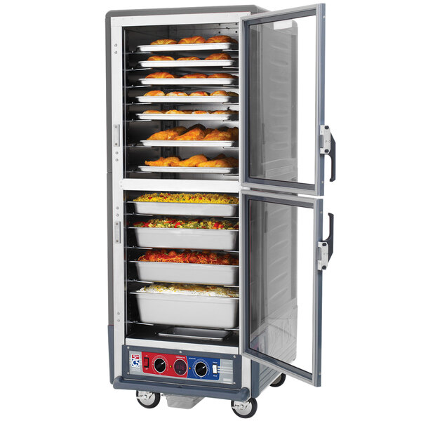 A gray Metro C5 holding and proofing cabinet with food inside.