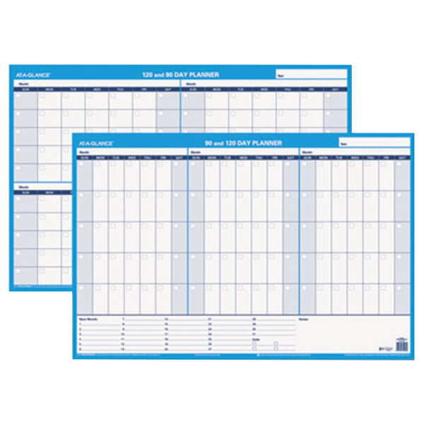 Two white calendar sheets with a blue border, white and blue grid, and black lines.