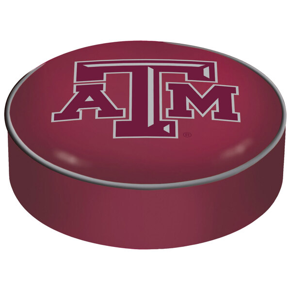 A red round Texas A&M Aggies bar stool seat cover with a logo on it.