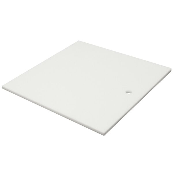 A white square poly-vance cutting board with a hole in the middle.