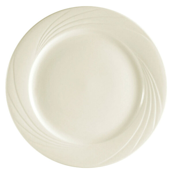 A CAC Garden State white porcelain plate with a wavy design.