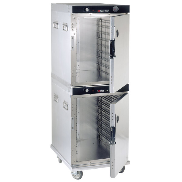 A large stainless steel Cres Cor holding cabinet with two doors open.