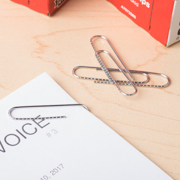 A piece of paper with Acco paper clips on it.