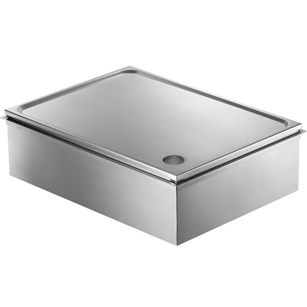 A silver rectangular stainless steel drop-in induction griddle with a lid.