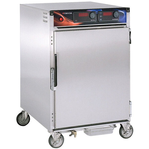 A large stainless steel Cres Cor holding cabinet with wheels.