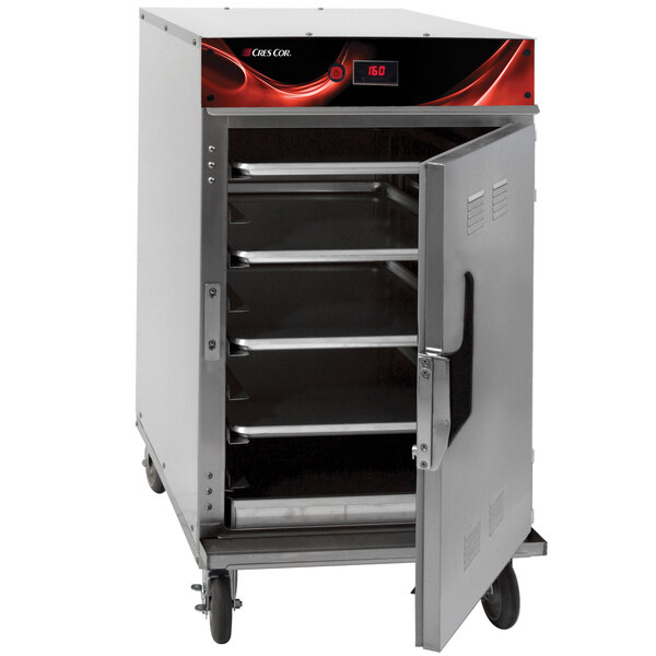 A metal cabinet with shelves and a large metal oven.