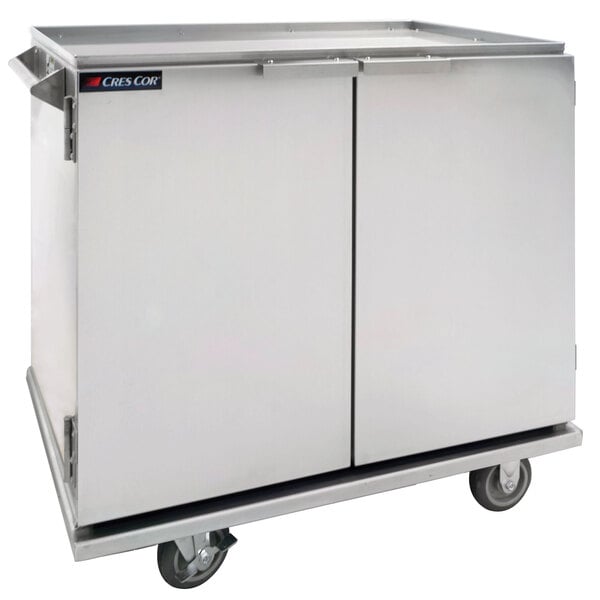 A stainless steel Cres Cor enclosed in-suite service cart with wheels.