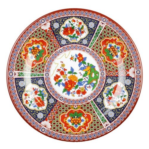 A close-up of a Thunder Group Peacock melamine plate with colorful floral designs.