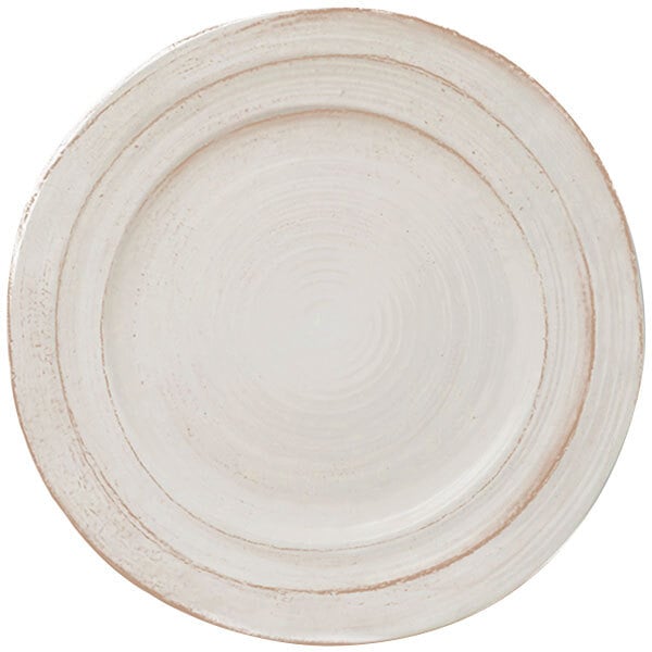 An Elite Global Solutions Della Terra off white melamine plate with a brown rim.