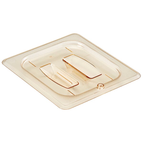 A clear plastic 1/6 size food pan lid with a metal handle.