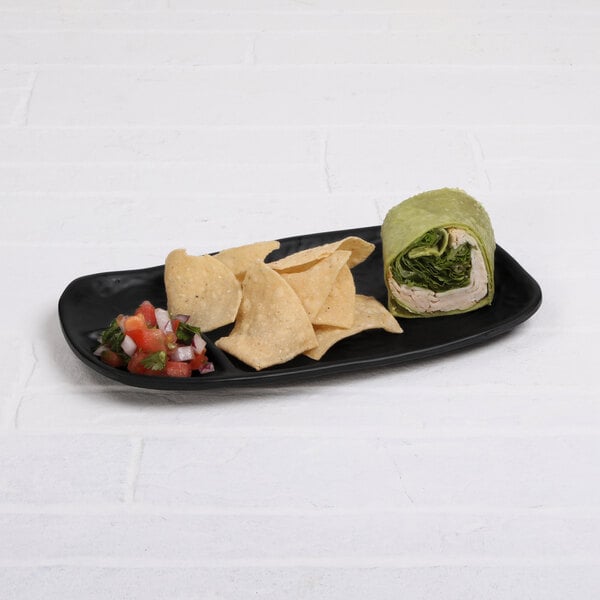 A black Elite Global Solutions melamine tray with food on it.
