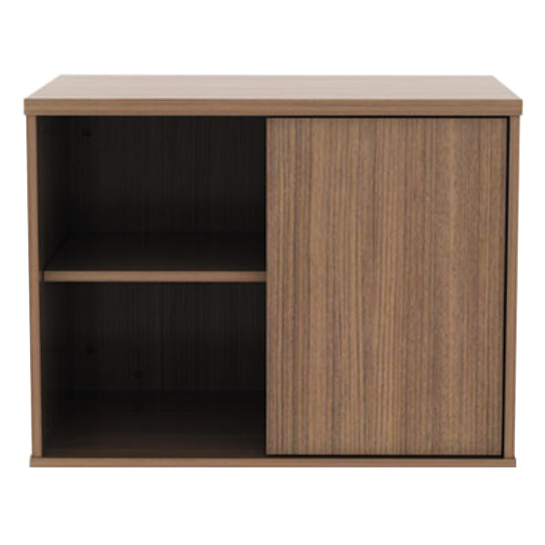 A walnut Alera low storage cabinet with two shelves and sliding doors.