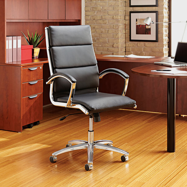 A black leather Alera office chair with chrome swivel base.