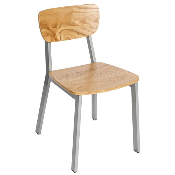 A BFM Seating Hamilton wooden chair with metal legs.