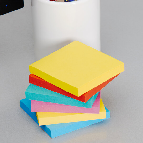 A stack of 3M Jaipur Collection Post-It Note pads with colorful paper on top.