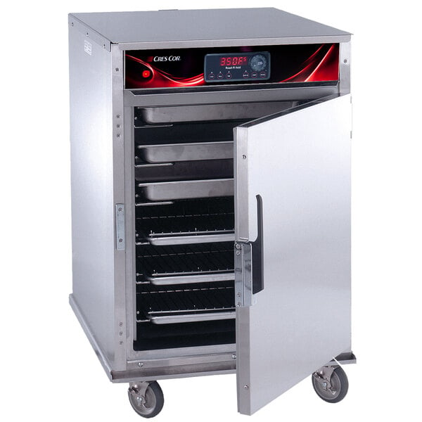 A Cres Cor stainless steel half height roast-n-hold convection oven with trays inside.