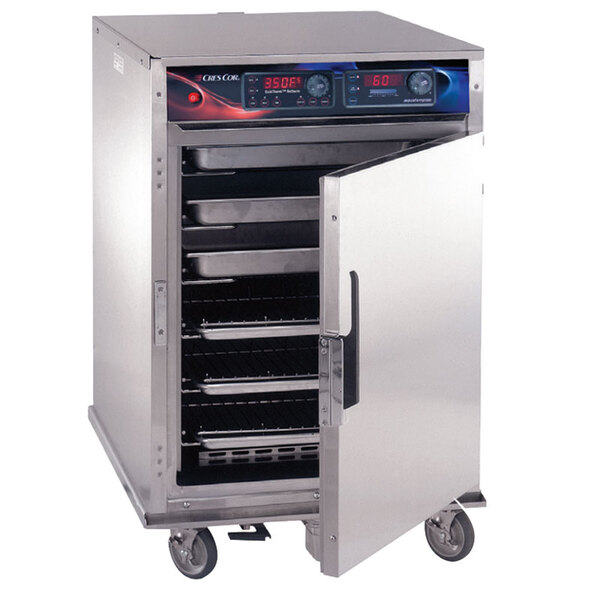 A large stainless steel Cres Cor convection oven with trays in a room.