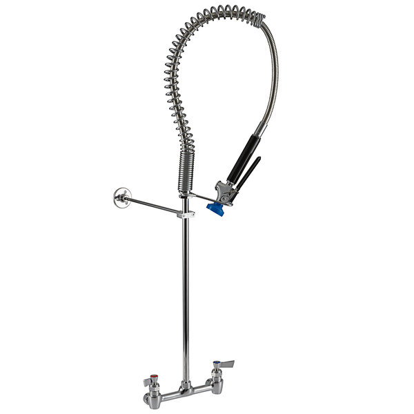 A Fisher chrome wall mounted pre-rinse faucet with a metal tube and spring.