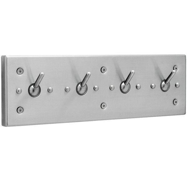 A silver stainless steel Bobrick clothes hook strip with four hooks.