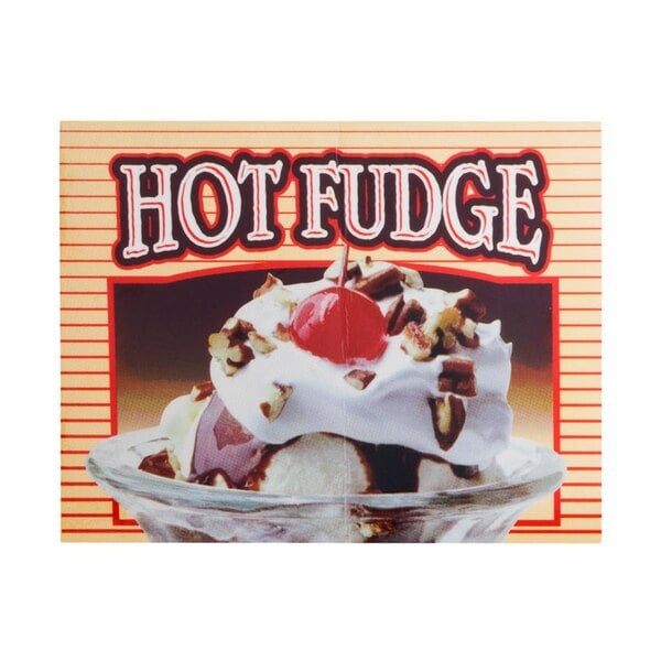 A close up of a hot fudge decal on a countertop warmer.