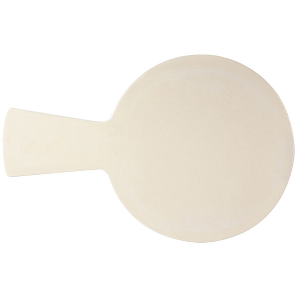 A white round serving board with a black handle.