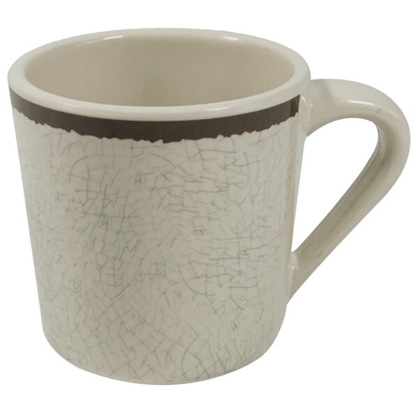 A white coffee mug with a brown stripe.