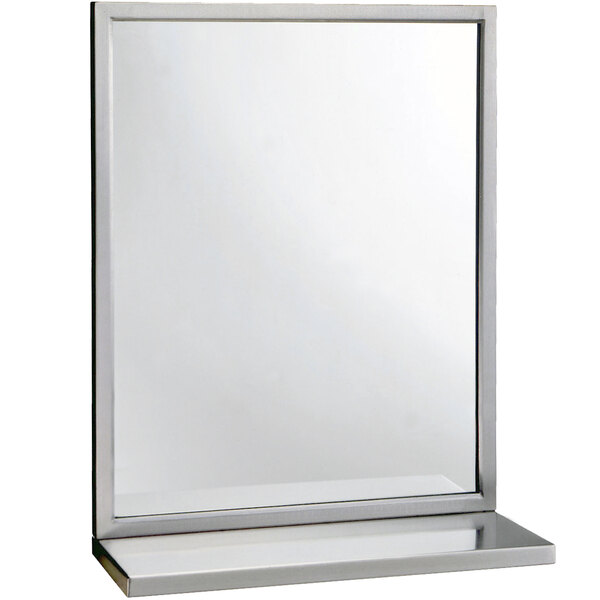 A stainless steel mirror with a shelf on the bottom.